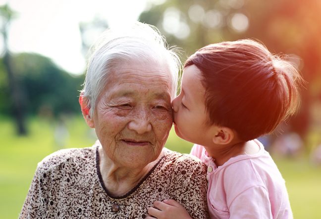Tender moment between (奶奶)Nǎinai and her grandchild
